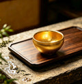 Jian Zhan Tea Bowl with Gold Oil Spot Glaze and Gilt Accents