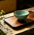 Jian Zhan Tea Bowl with Celadon Glaze and Crackled Ice Patterns